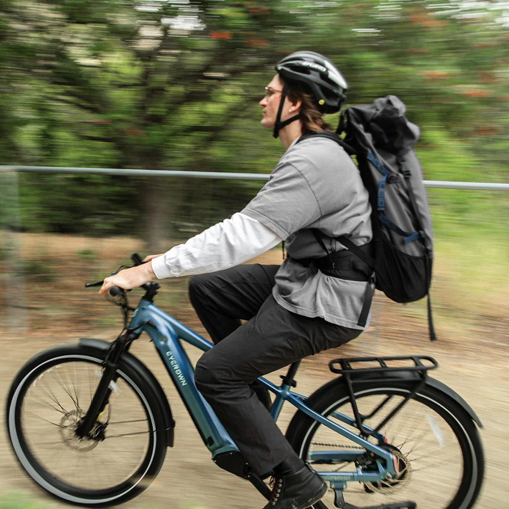 Rider cycling on a blue Cycrown DREMAX high-step commuter e-bike